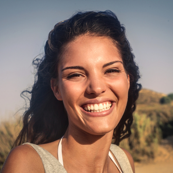 Young Woman Smiling Outdoors